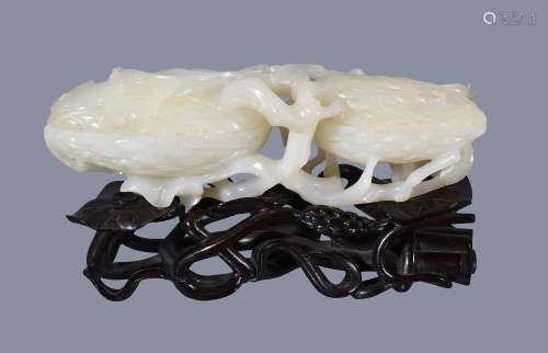 A Chinese white jade double 'fruit' box and cover