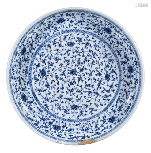 A Chinese blue and white dish, decorated with stylised lotus flowers and...
