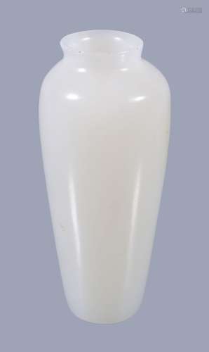A Chinese white jade vase, of tapering cylindrical form with short slightly...