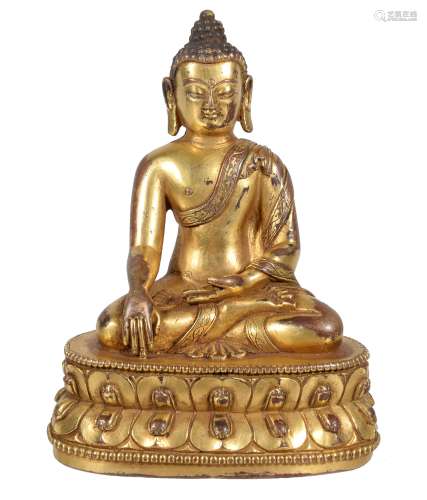 A gilt-bronze figure of Buddha, Tibet, circa 16th century