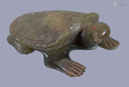 A Chinese green jade tortoise, with head turned to one side, 11.5cm long