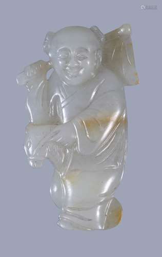 A Chinese pale celadon and russet jade carving of boy