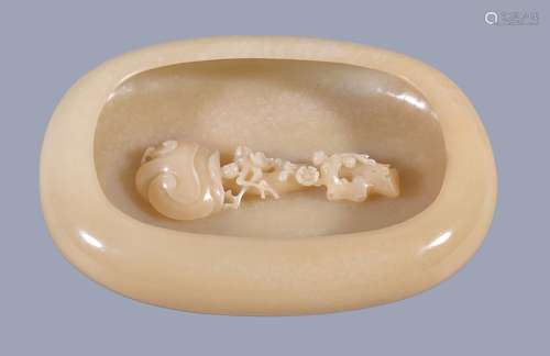 A Chinese mottled light brown jade 'ruyi' head sceptre dish, of oval shape