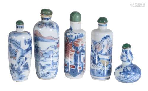 Four Chinese blue and white and copper-red snuff bottles, of cylindrical form