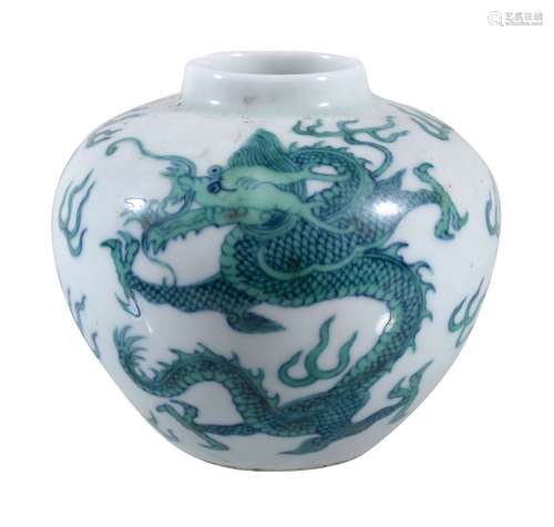 A Chinese green enamelled 'dragon' jar, the ovoid body painted in underglaze...