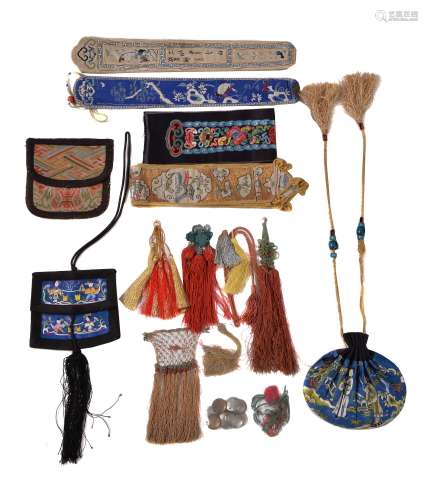 A group of 19th century Chinese silk tassels and purses, comprising
