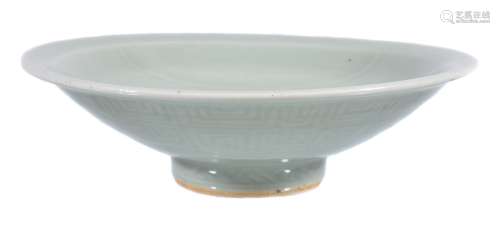 A Chinese porcelain celadon dish, the interior plain and the underside with...