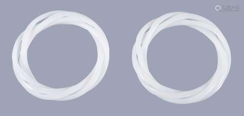 A pair of Chinese white jade triple articulated bangles