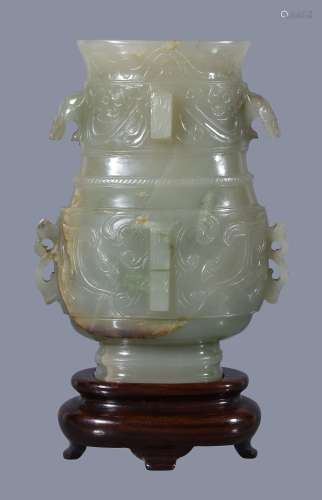 A Chinese celadon jade archaistic vase , hu
