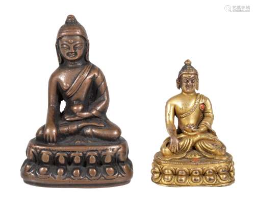 Ω A small Tibetan gilt-bronze figure of Buddha, 19th century or earlier