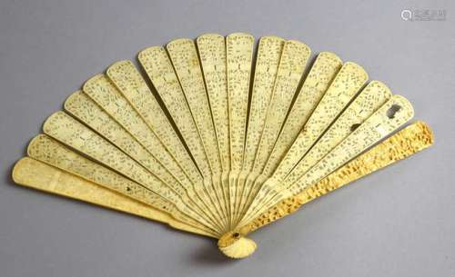 18th century Cantonese carved ivory fan with pierced decoration of pagodas, figures, flowers and foliage,PLEASE NOTE: THIS ITEM CONTAINS OR IS MADE OF IVORY. Buyers must be aware that regulations of several countries, including USA, prohibit the imp