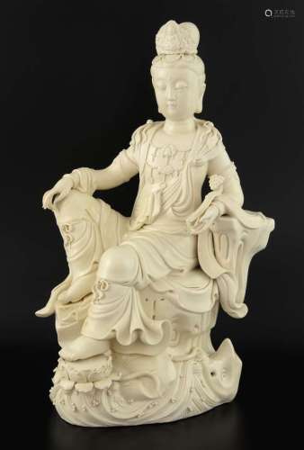 Chinese blanc de chine figure of Guan Yin seated on a throne with a rui sceptre, impressed mark to back of figure, 39cm high,