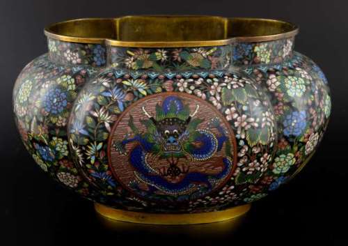 Chinese cloisonne enamelled bowl of lobed form decorated with two panels of a five clawed dragon and the flaming pearl, framed with extensive flowers, foliage and Phoenixes, impressed mark to base, 17.5cm high,