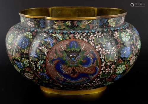 Chinese cloisonne enamelled bowl of lobed form decorated with two panels of a five clawed dragon and the flaming pearl, framed with extensive flowers, foliage and Phoenixes, impressed mark to base, 17.5cm high,