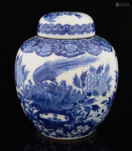 Chinese blue and white ginger jar and cover decorated with a bird, flowers and foliage, six character mark to base, 22cm high,