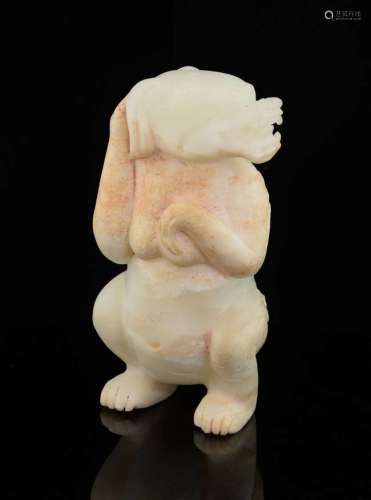 Chinese white and pink mottled carved jade figure of a standing bear, 12.5cm high,