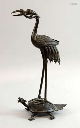 Japanese cast bronze group of a heron standing on the back of a turtle, 30cm high,