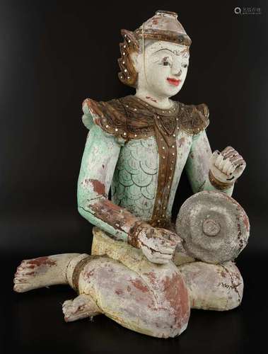 Far Eastern carved and painted kneeling figure, 46cm high,