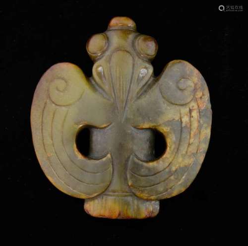 Chinese Hong Shan style carved green and brown mottled jade pendant in the form of a stylised bird, 10.5cm long,