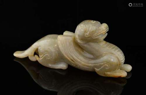 Chinese grey and brown streaked jade carving of a recumbent mythical beast, 16.5cm long,