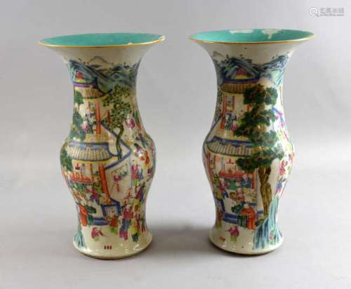 Pair of late 19th century Cantonese famille rose vases decorated with a scene of a festival, 40.5cm high,