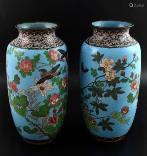 Pair of Chinese blue ground cloisonné vases decorated with birds amongst foliage, 31cm high,