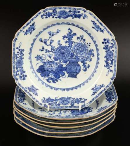 Matched set of four Chinese blue and white bowls decorated with herons in a garden setting, and two others with vases of flowers, each 23cm wide, (6),