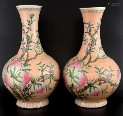 Pair of modern Chinese famille rose vases decorated with peaches, stamped iron red six character mark to base, 39.5cm high,