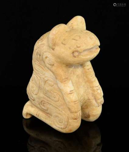 Chinese Zhou style white and light brown jade carved anthropomorphic feline figure, with scrolling decoration, 11.5cm high,