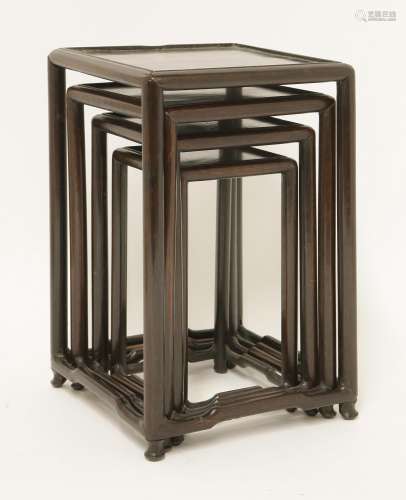A nest of four Chinese graduated tall stands, late 19th/early 20th century, of square form on ...