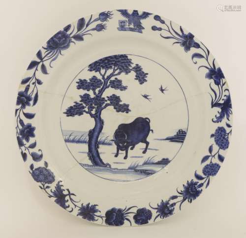 A rare Chinese blue and white armorial charger, early 18th century, painted with a buffalo ...