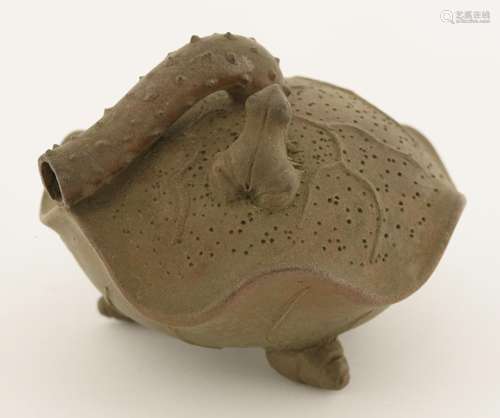 A Chinese yixing water dropper, in the shape of a lotus leaf on three shell feet, a frog sitting on ...