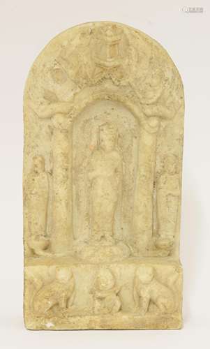 A Chinese marble Buddhist panel, in the Northern Qi style and probably of the period, the centre ...