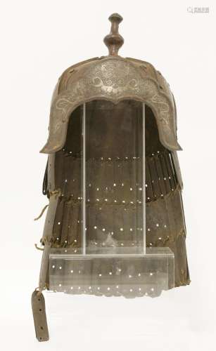 An iron helmet,  19th century or earlier, probably Tibetan, the skull consists of seven plates ...