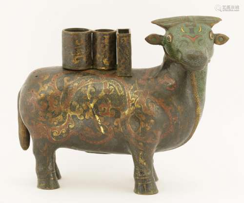 A Chinese cloisonné bull, standing with his head tilted to the right, finely enamelled with scrolls ...