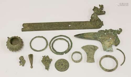 A collection of Chinese and Japanese archaic metalwork, comprising: a Chinese bronze dagger, with a ...