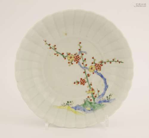 A Japanese Kakiemon-type dish, 19th century, of lobed hexagonal form, the centre with a roundel ...