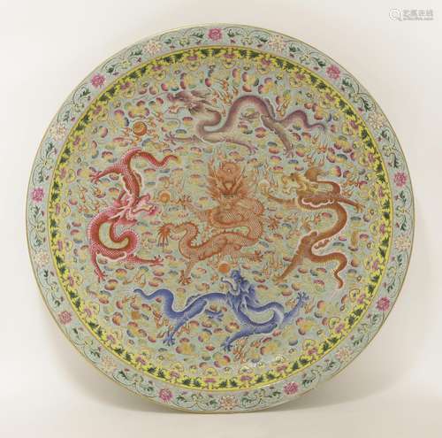 A Chinese famille rose charger,  20th century, painted with five dragons chasing flaming pearls ...