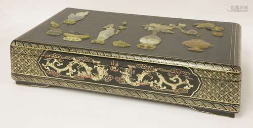 A Chinese lacquered box and cover, 20th century, painted with dragons chasing a flaming pearl in ...