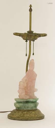 A Chinese rose quartz lady, 20th century, with a ruyi in her arm standing by a phoenix on floret ...