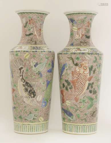 A pair of Chinese famille verte vases, early 20th century, each of cylindrical form, painted with ...