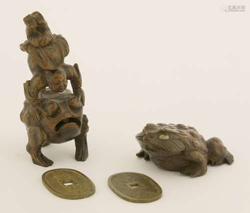 A Japanese bamboo Gama Sennin, 19th century, carved with the immortal doing a handstand on the back ...