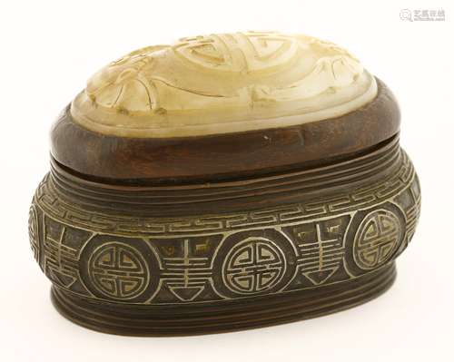 A Chinese bronze box and cover, early 20th century, with stylised shou characters between key ...