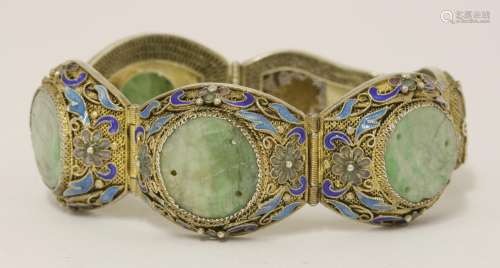 A Chinese silver gilt hinged bracelet, 1930s, the mesh ground enamelled with scrolling flowers ...