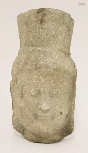 A Chinese stone head of a bodhisattva,  18th century or earlier, in the Sui style, wearing a high ...