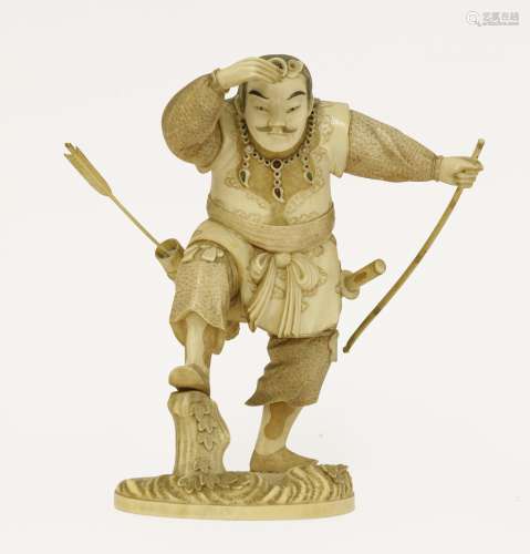 A Japanese ivory okimono, Meiji period (1868-1912), of a samurai, his right foot resting on a piece ...