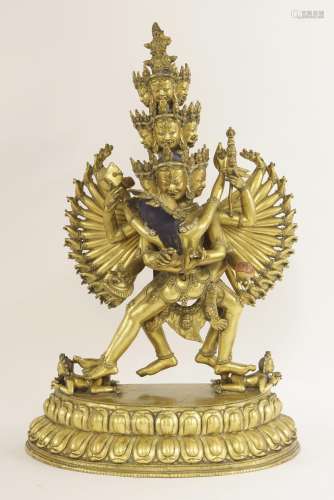 A gilt-bronze bodhisattva group, Chakrasamvara and Vajravarahi, 19th/early 20th century, locked in ...