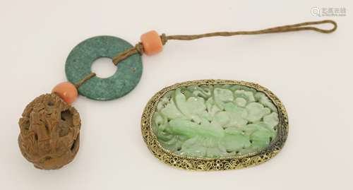 A Chinese jade brooch, carved and pierced with leafy flowers, 4.3cm, mounted with filigree work, ...