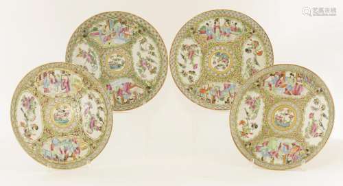 Four Chinese Canton enamelled plates, late 19th century, of circular form, typically painted with ...