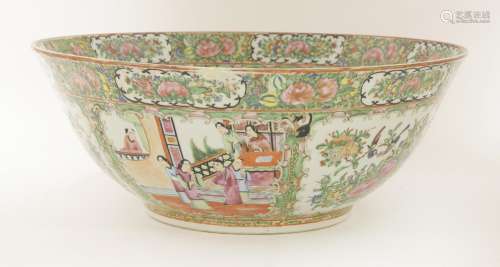 A Chinese Canton famille rose punch bowl, early 20th century, painted with figures, birds and ...